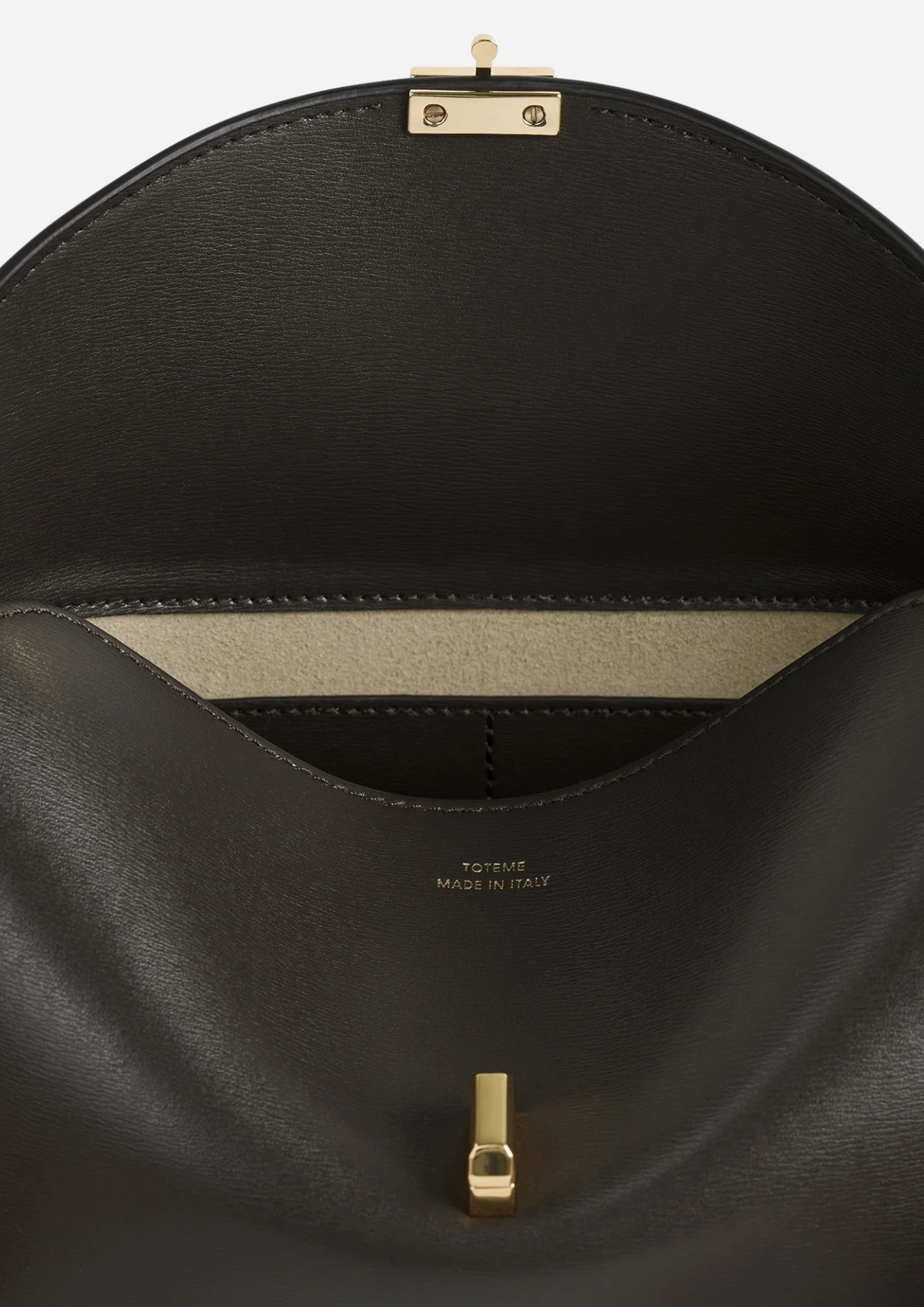 Interno di Toteme T-Lock Clutch Bark in Pelle Palmellato